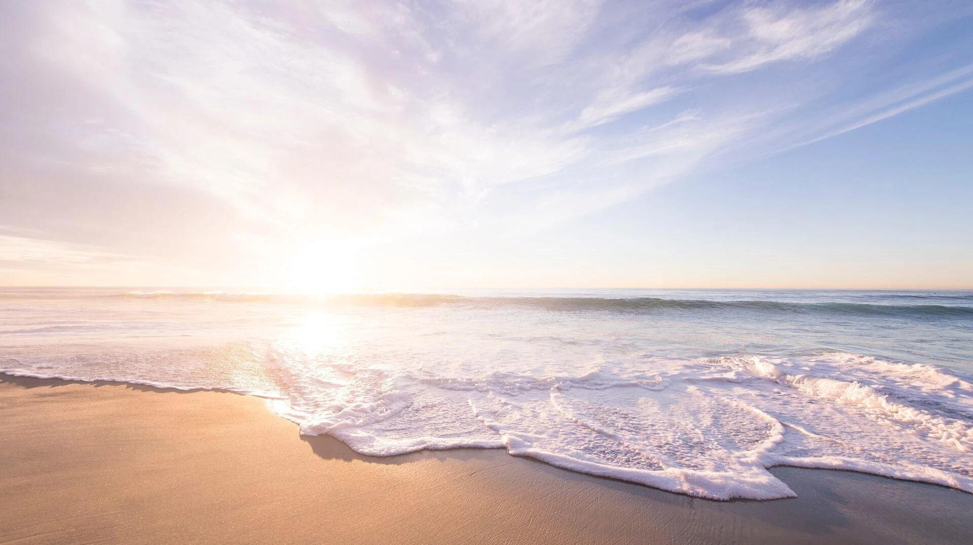 Sunlight over a peaceful shoreline